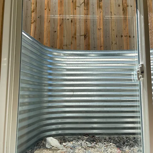 The same basement window after professional cleaning