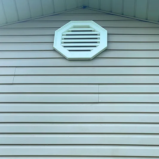 House siding freshly pressure washed in London, Ontario