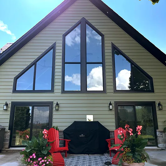 The same tall windows seen cleaned from outside